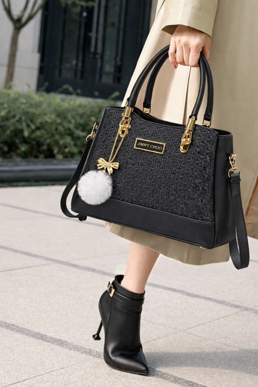 Elegant Jatt Black Designer Handbag with Gold Hardware & Pom-Pom Charm