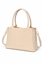 Elegant Beige Designer Handbag with Gold Hardware & Pom-Pom Charm