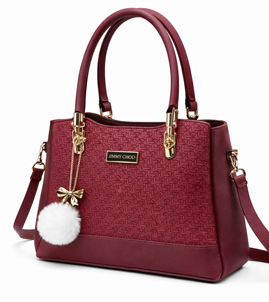Elegant Mahroon Designer Handbag with Gold Hardware & Pom-Pom Charm