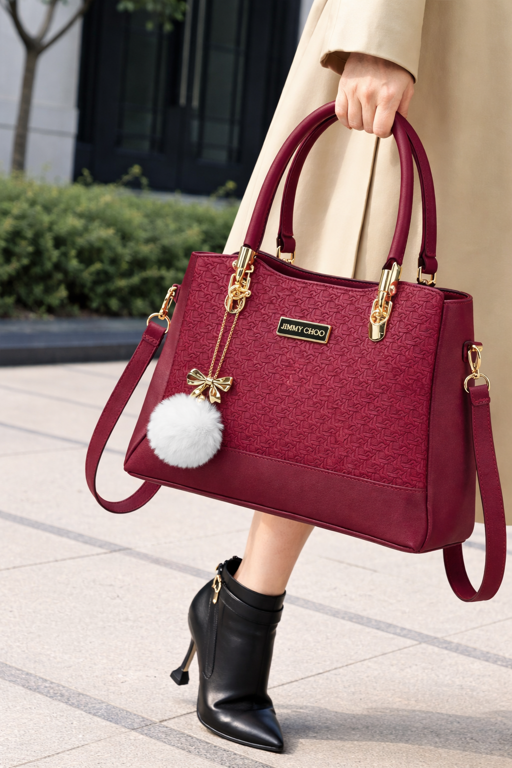 Elegant Mahroon Designer Handbag with Gold Hardware & Pom-Pom Charm