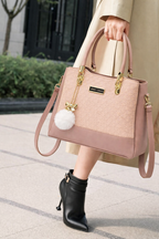 Elegant Blush Pink Designer Handbag with Gold Hardware & Pom-Pom Charm
