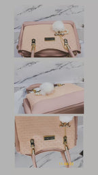 Elegant Navy Blue Designer Handbag with Gold Hardware & Pom-Pom Charm